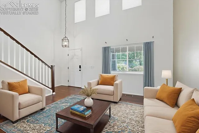 a living room with furniture or couch and a window