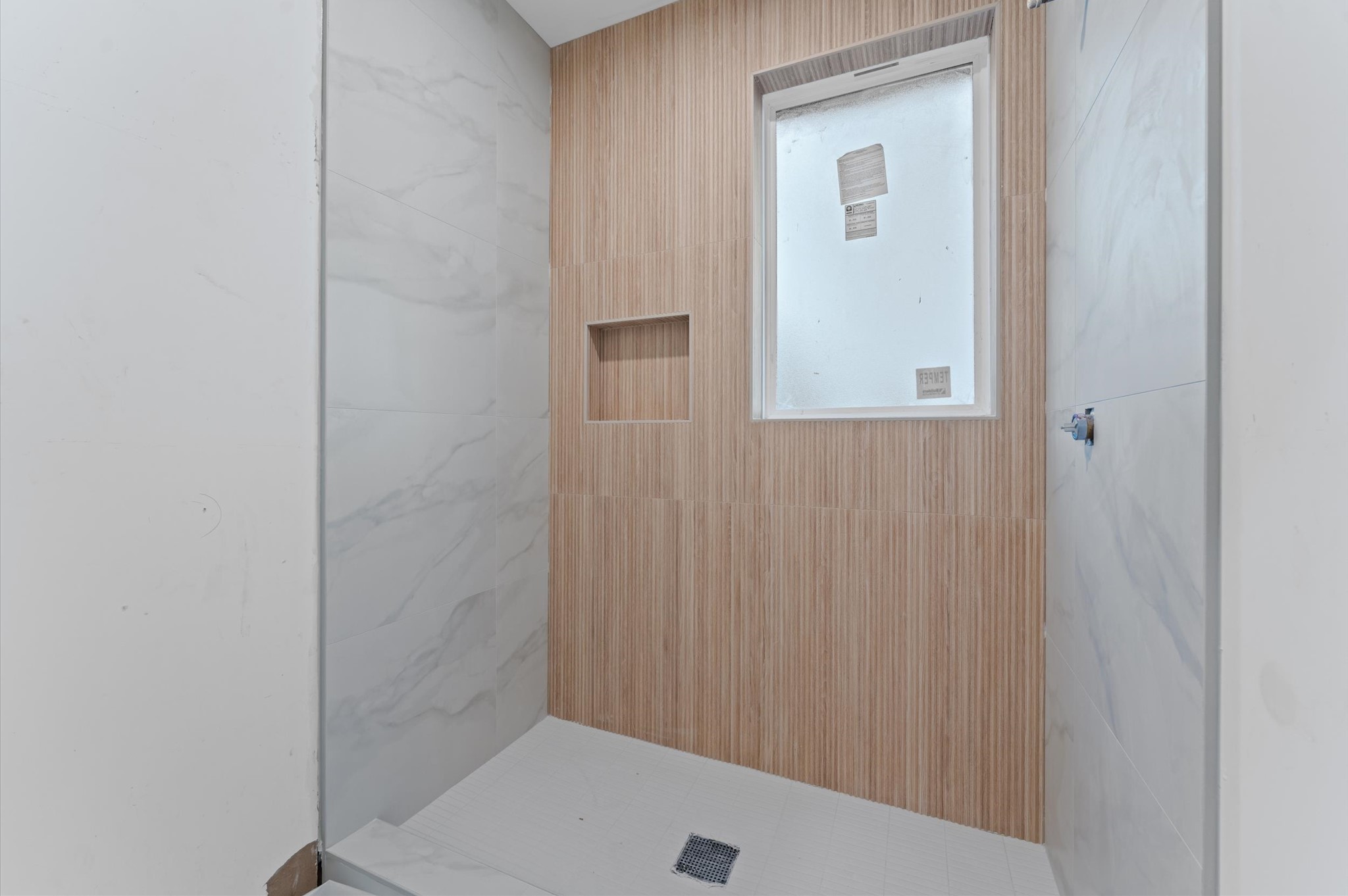 813 A Lawrence Street Houston, TX 77007 - Photo 22 of 31 a bathroom with a shower