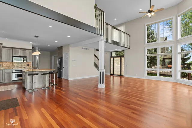 a view of kitchen with cabinets and wooden floor