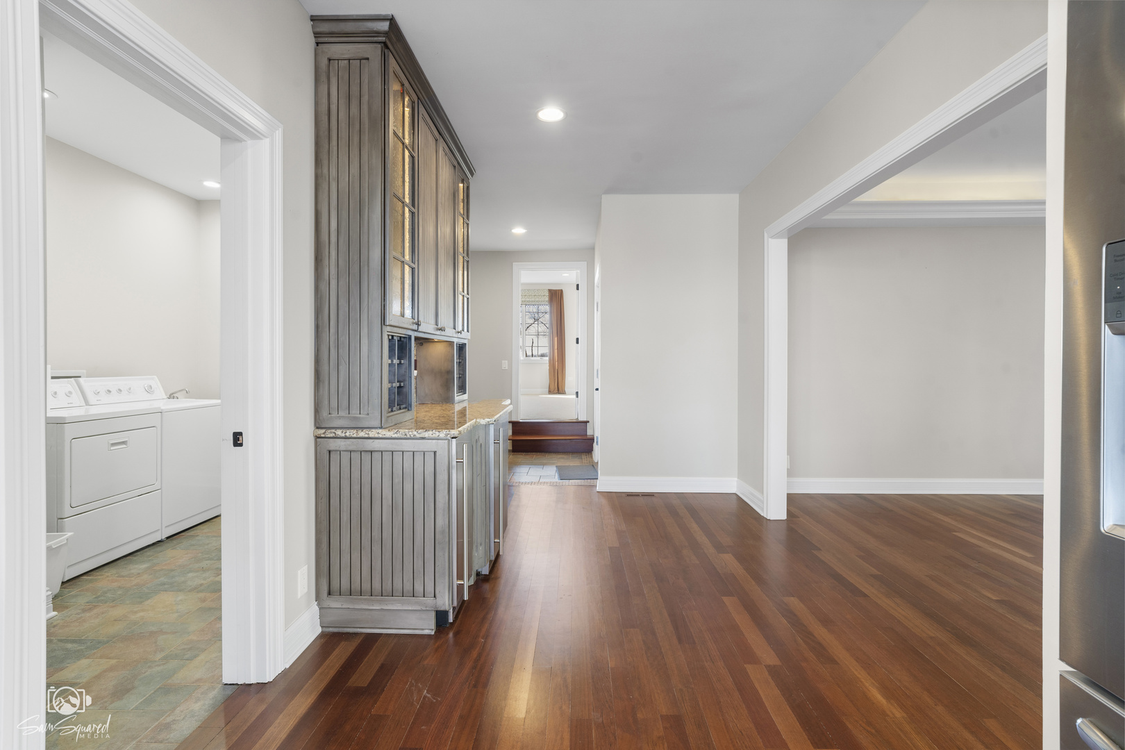8043 Tamarack Lane Morris, IL 60450 - Photo 20 of 55 a view of a hallway with wooden floor and a sink