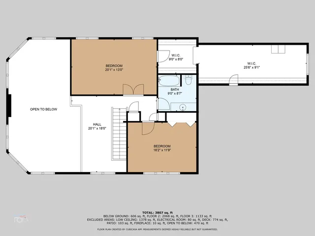 a aerial view of a house with a yard