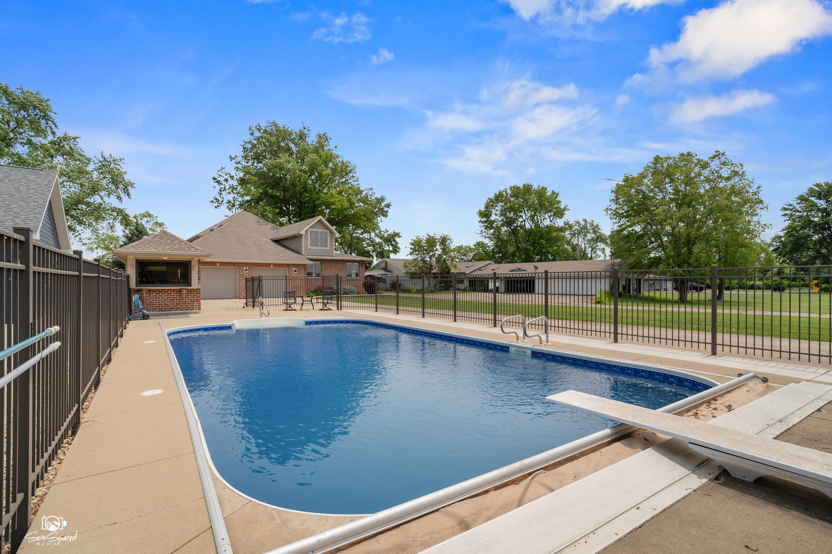 8043 Tamarack Lane Morris, IL 60450 - Photo 7 of 55 a view of swimming pool with seating area and trees in the background