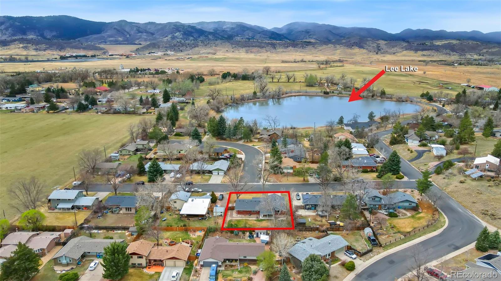 924 Teal Drive Fort Collins, CO 80521 - Photo 2 of 32 a view of lake and mountain