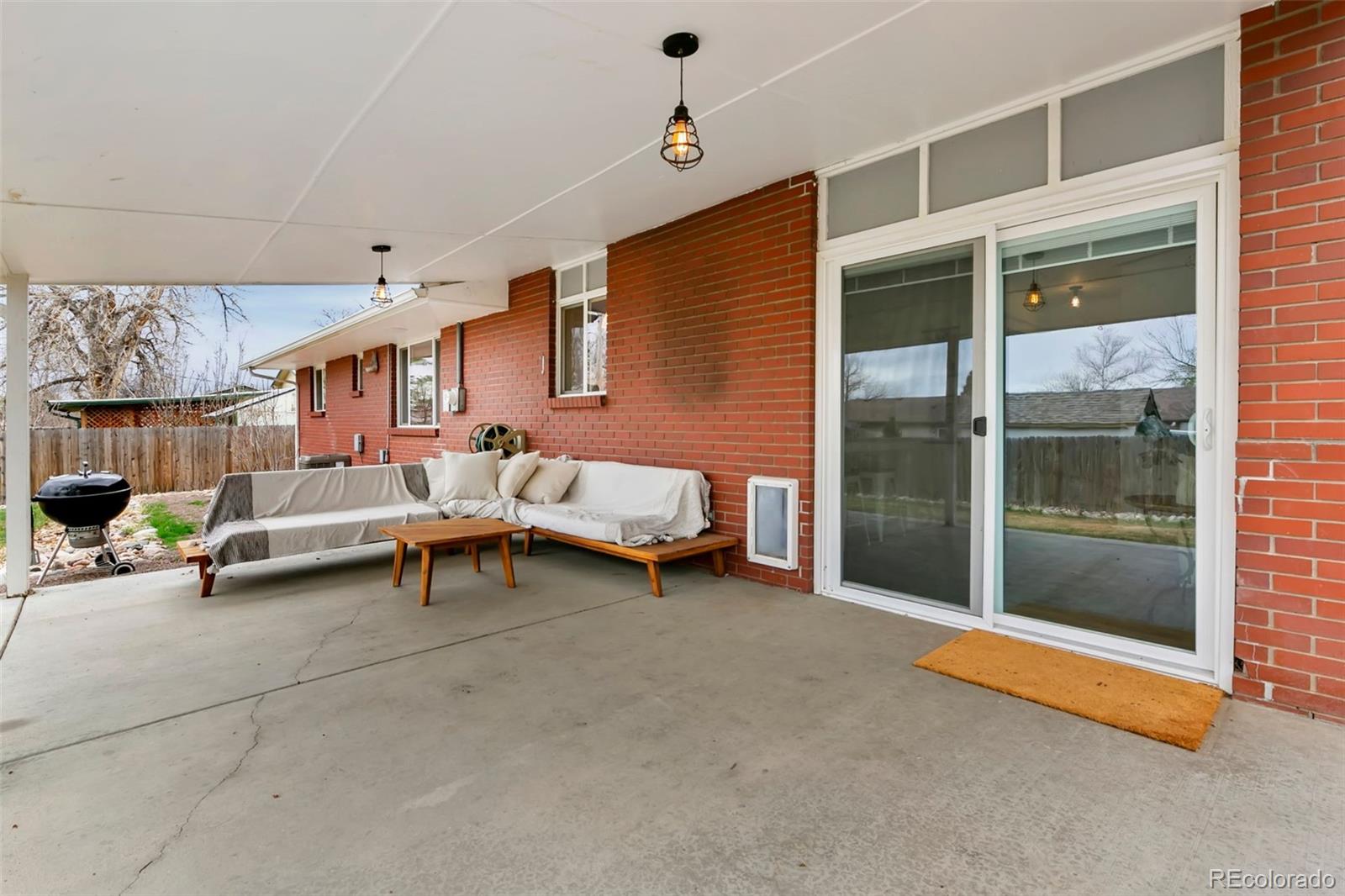 924 Teal Drive Fort Collins, CO 80521 - Photo 24 of 32 a bedroom with furniture and a window