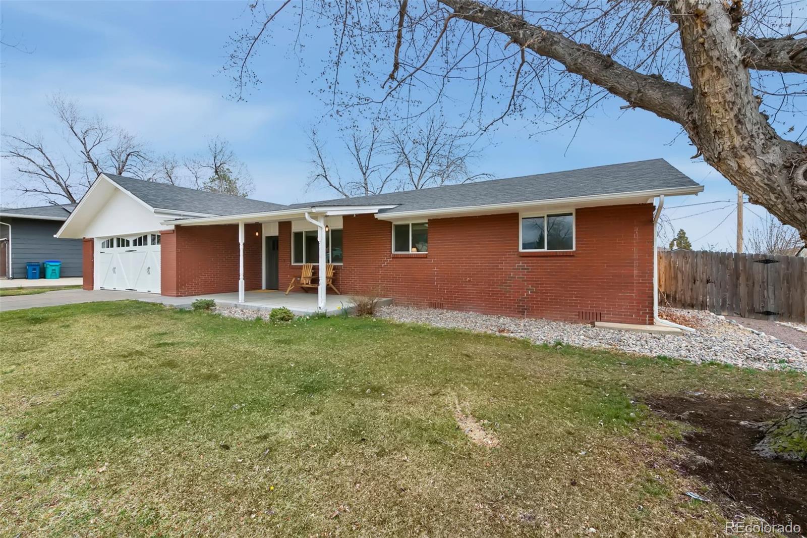 924 Teal Drive Fort Collins, CO 80521 - Photo 28 of 32 a front view of house with yard