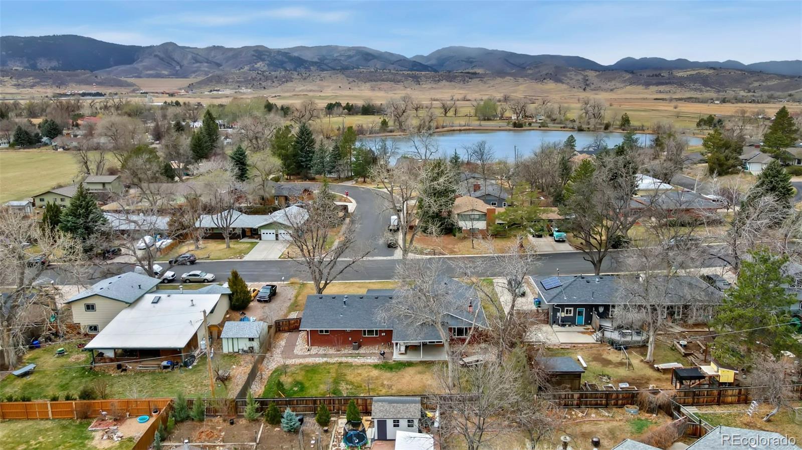 924 Teal Drive Fort Collins, CO 80521 - Photo 30 of 32 a view of a town with mountains in the background