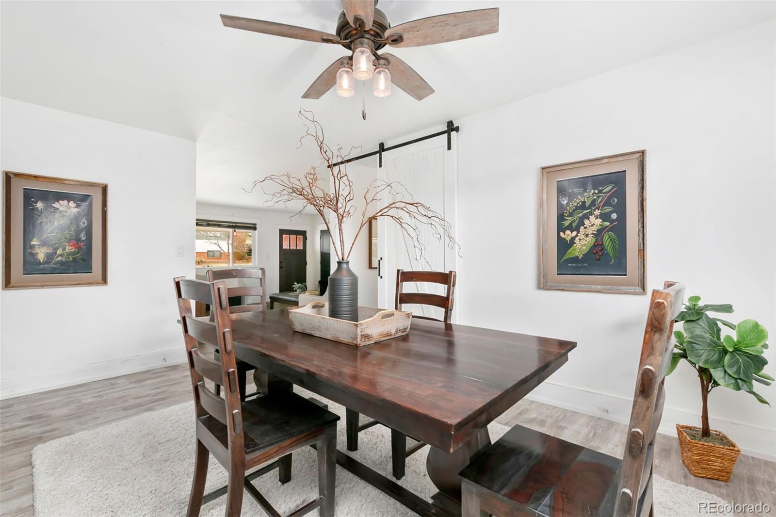 924 Teal Drive Fort Collins, CO 80521 - Photo 10 of 32 a view of a dining room with furniture