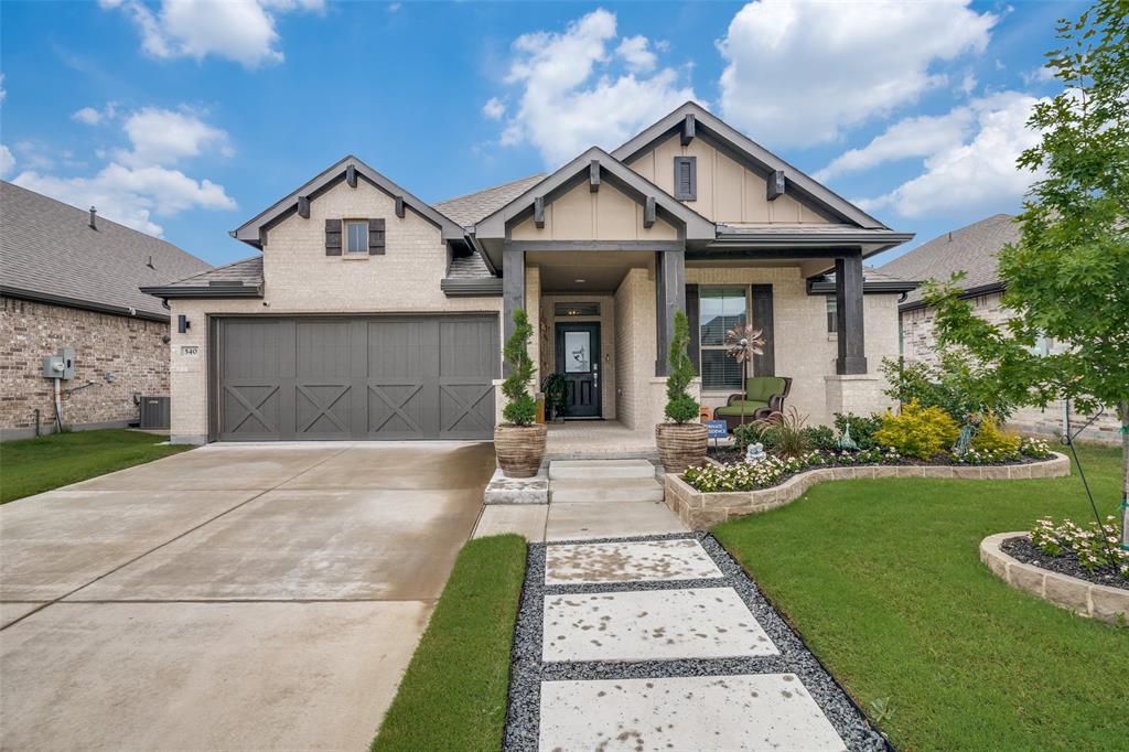540 Colt Drive Lavon, TX 75166 - Photo 1 of 1 a front view of a house with garden