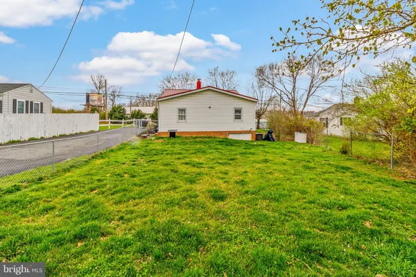 a view of a house with a big yard