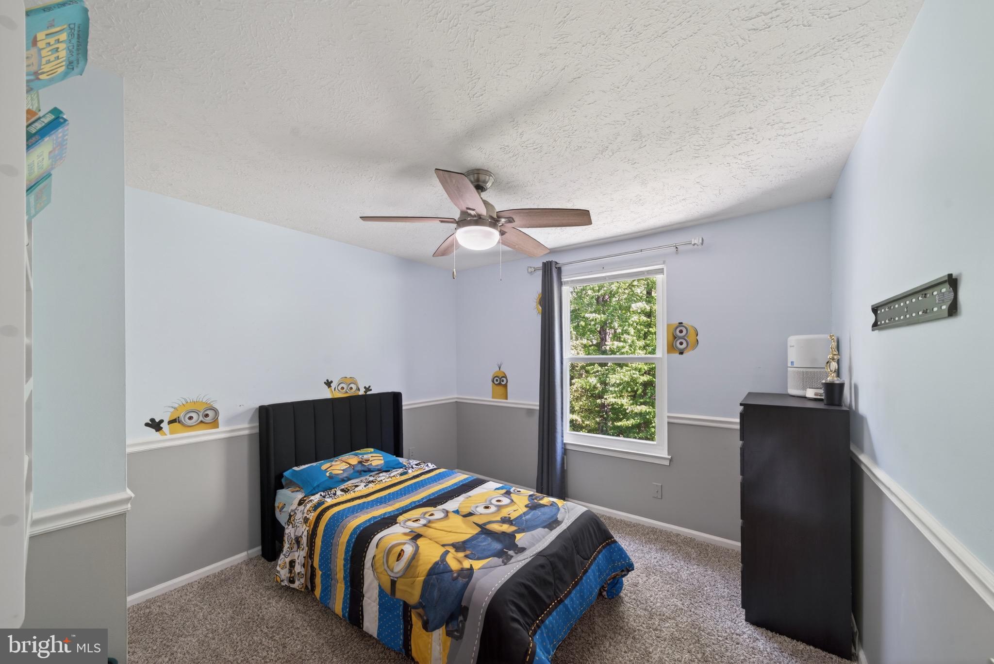 15095 Mill Spring Drive Dumfries, VA 22025 - Photo 18 of 36 a bedroom with a bed and a window
