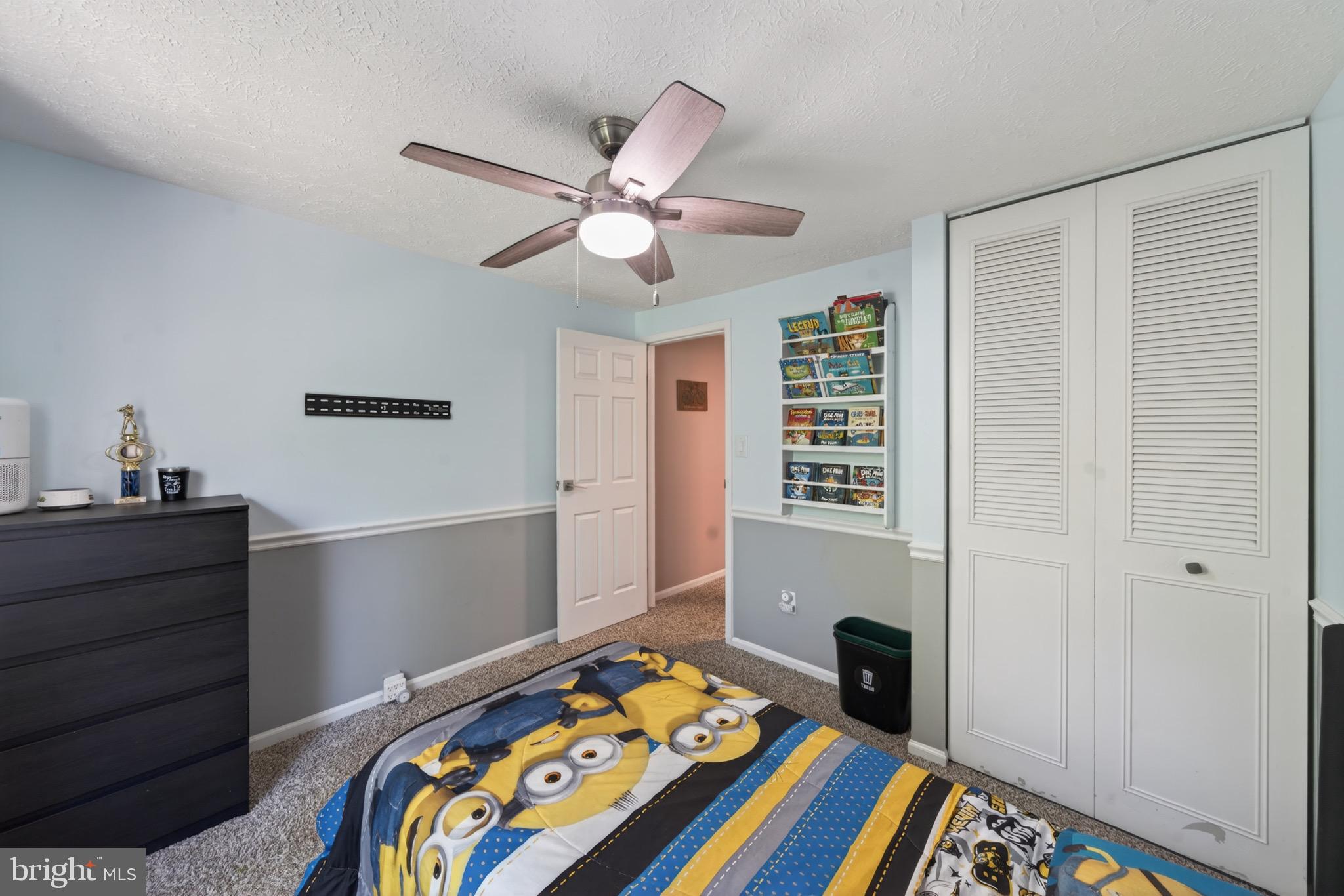 15095 Mill Spring Drive Dumfries, VA 22025 - Photo 19 of 36 a bedroom with a bed and a window