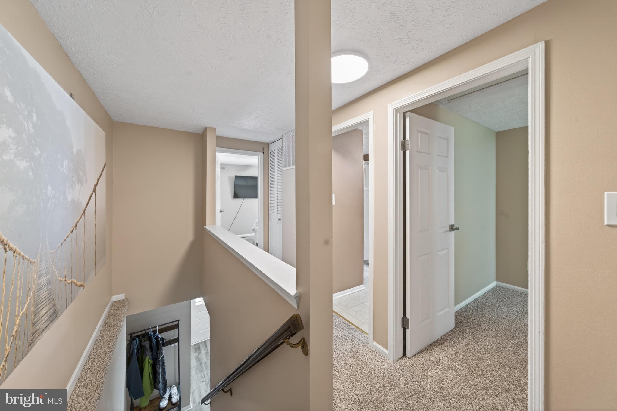 15095 Mill Spring Drive Dumfries, VA 22025 - Photo 20 of 36 a view of a livingroom from a hallway