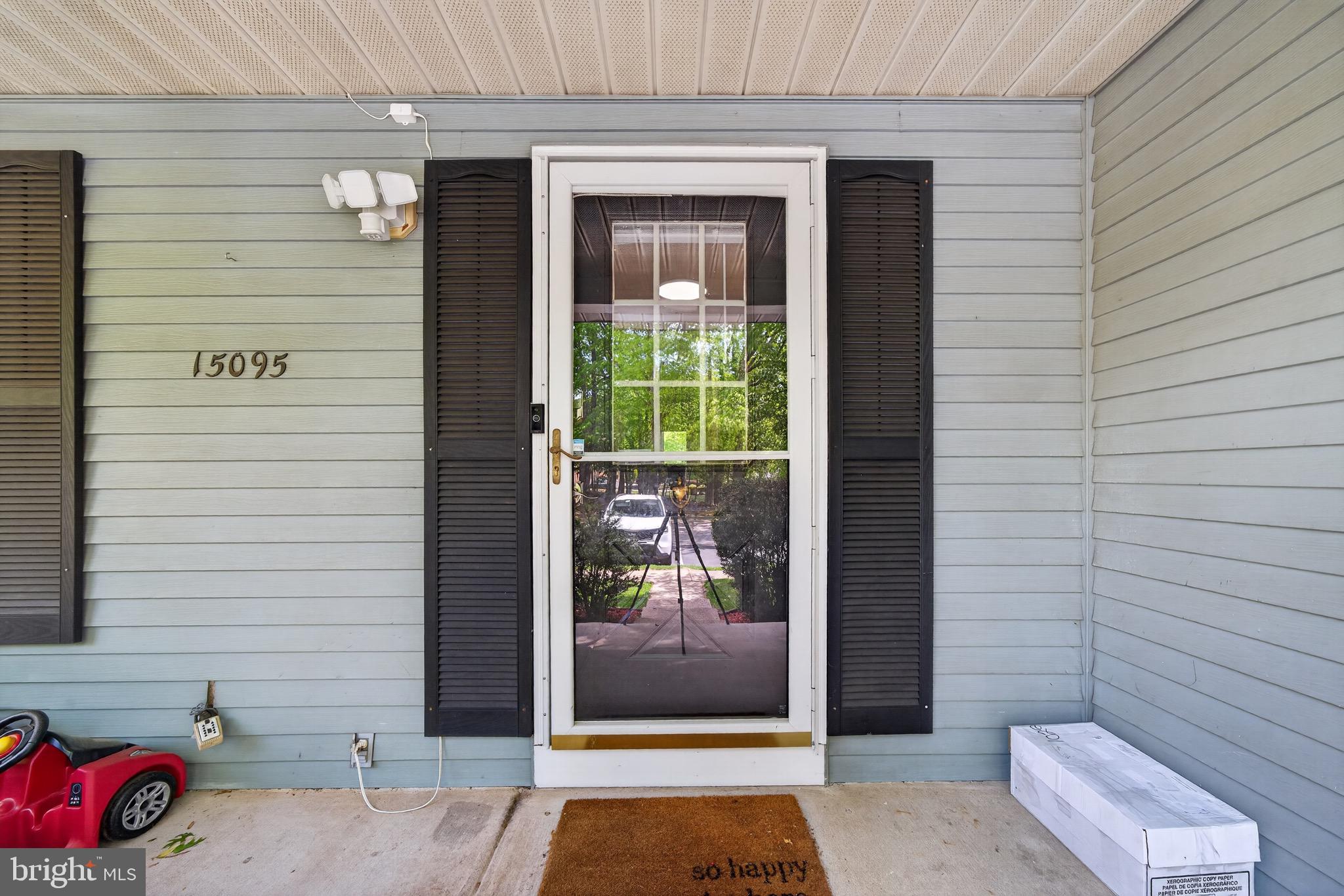 15095 Mill Spring Drive Dumfries, VA 22025 - Photo 2 of 36 a view of a door and a window