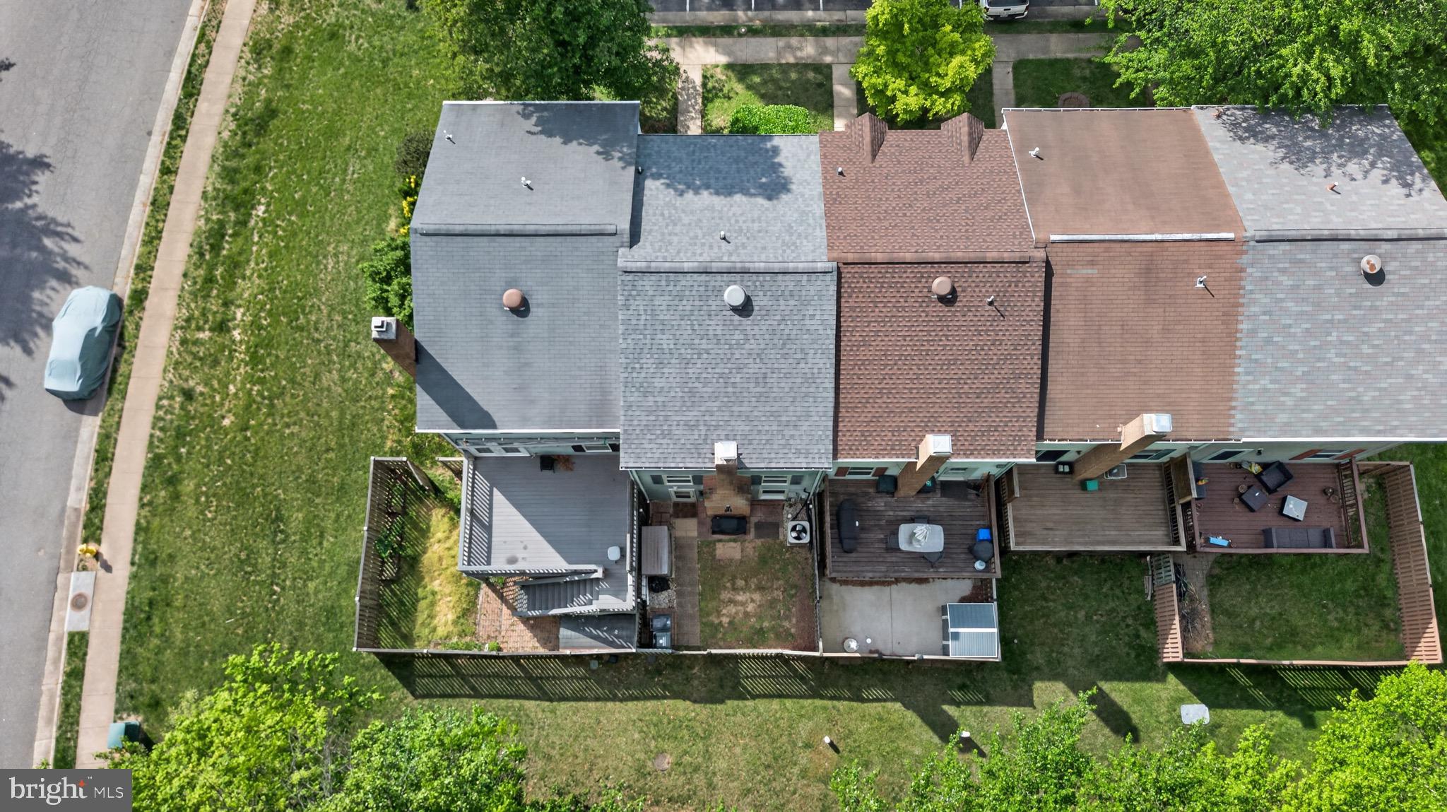 15095 Mill Spring Drive Dumfries, VA 22025 - Photo 29 of 36 an aerial view of residential houses with outdoor space and parking