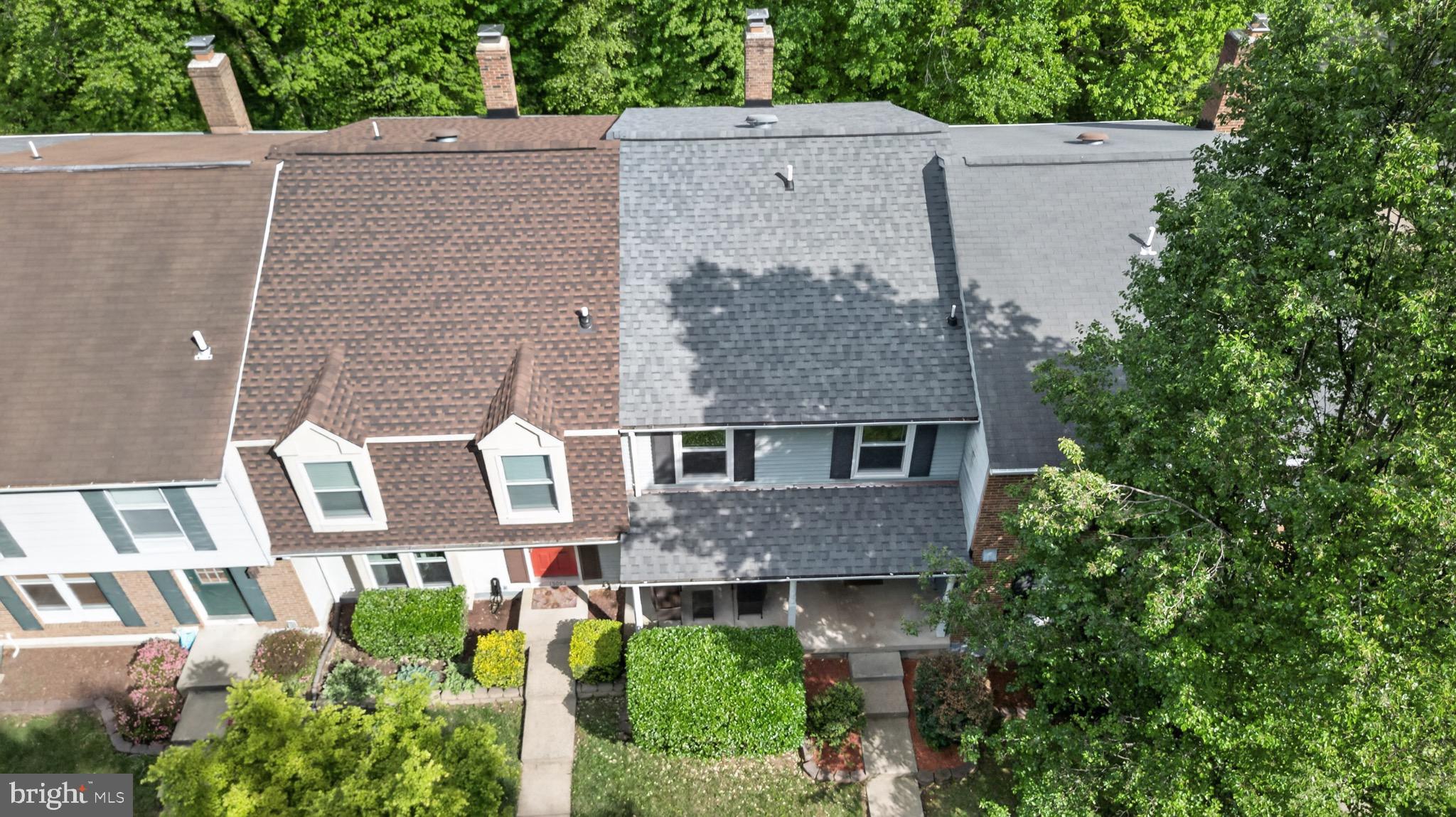 15095 Mill Spring Drive Dumfries, VA 22025 - Photo 31 of 36 a aerial view of a house with a garden and plants