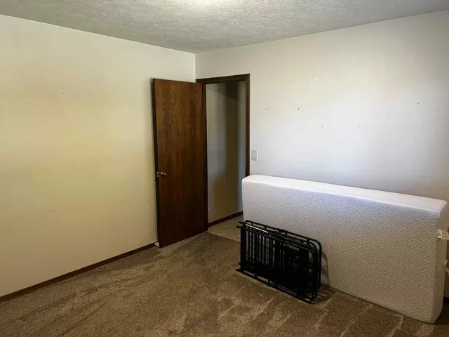 a bathroom with a toilet and a sink