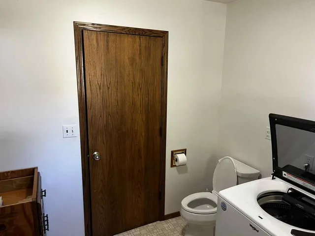 a bathroom with a sink a mirror and a shower