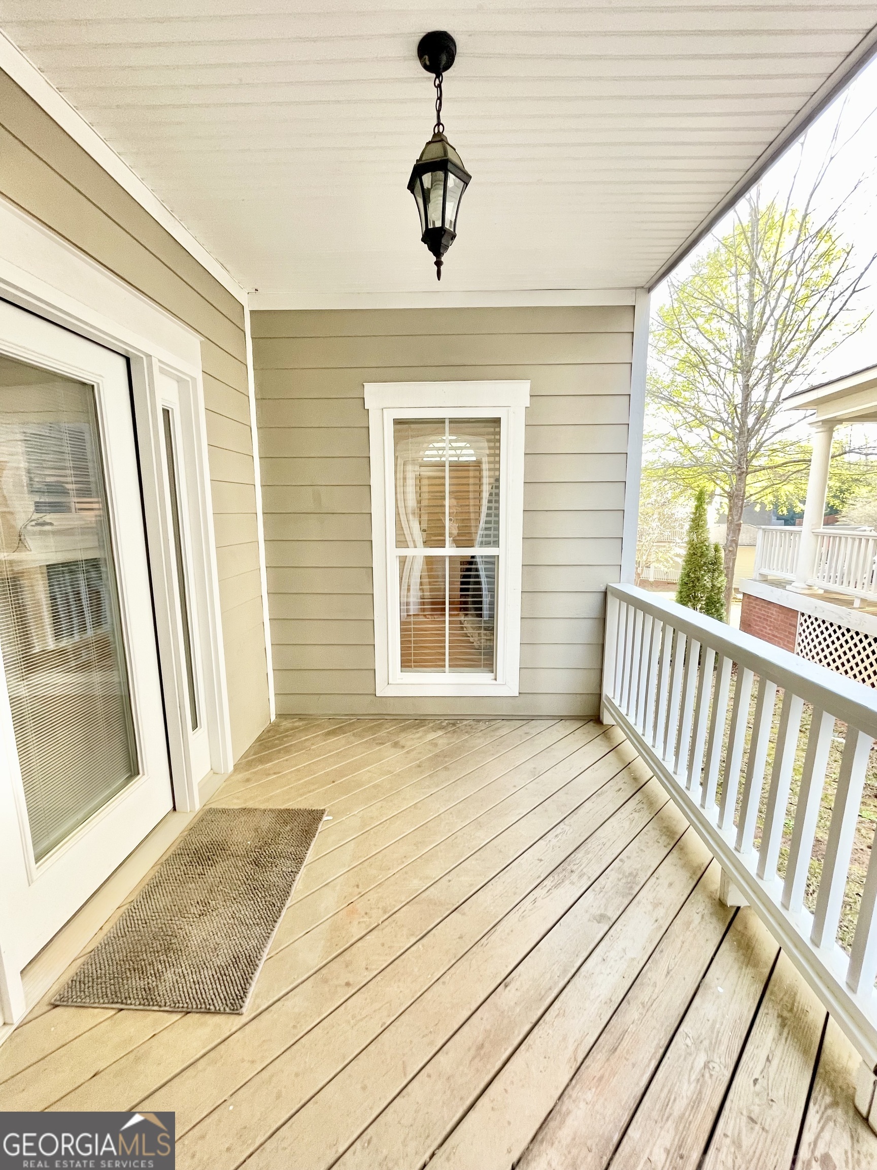 376 Providence Boulevard Macon, GA 31210 - Photo 25 of 26 a view of a room with wooden floor and windows