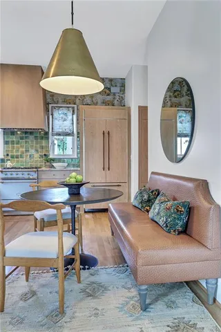 a kitchen with a sink appliances and cabinets