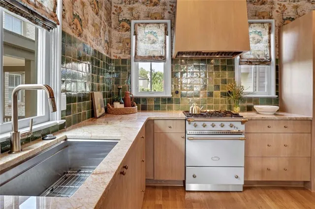 a bathroom with a toilet and a shower curtain