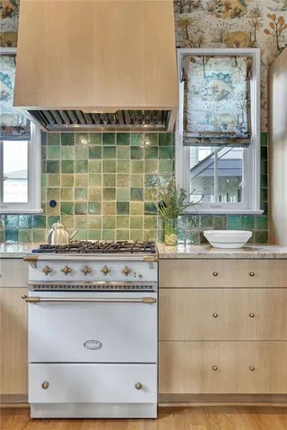 a wooden bench sitting in front of a building