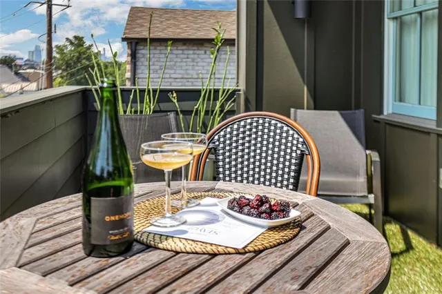 a table and chairs sitting in a backyard