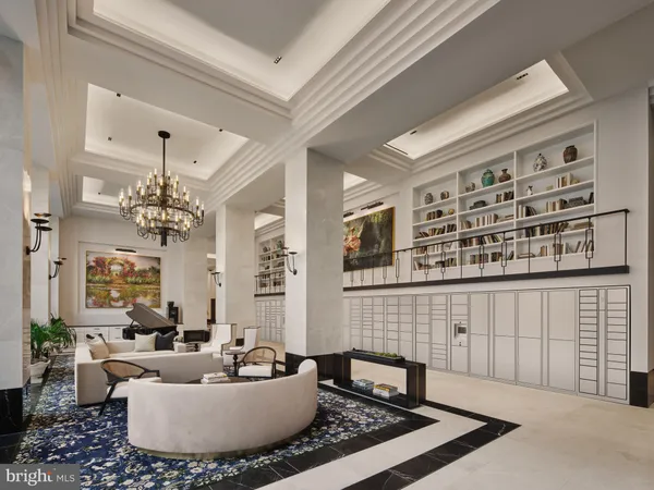 a living room with furniture and a chandelier