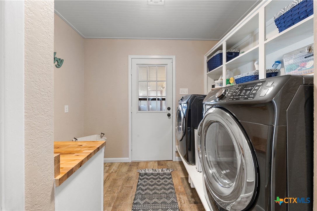 162 High Ridge Drive Bruceville, TX 76630 - Photo 23 of 35 a utility room with dryer and washer