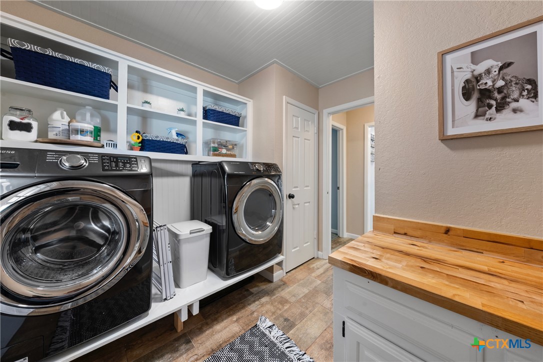 162 High Ridge Drive Bruceville, TX 76630 - Photo 24 of 35 a utility room with dryer and washer