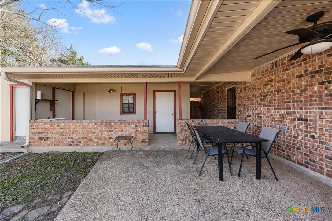 162 High Ridge Drive Bruceville, TX 76630 - Photo 26 of 35 a view of a house with patio and a yard