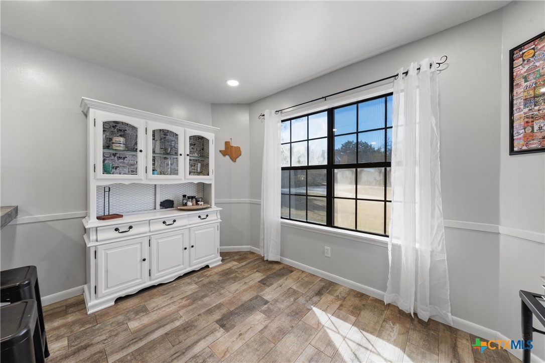 162 High Ridge Drive Bruceville, TX 76630 - Photo 9 of 35 a room with a stove and a window