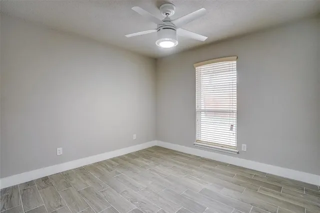 a bathroom with a bathtub and a sink
