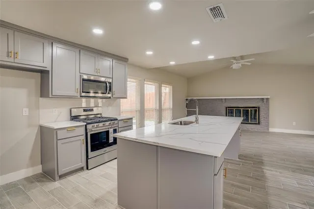 a room with closet and wooden floor