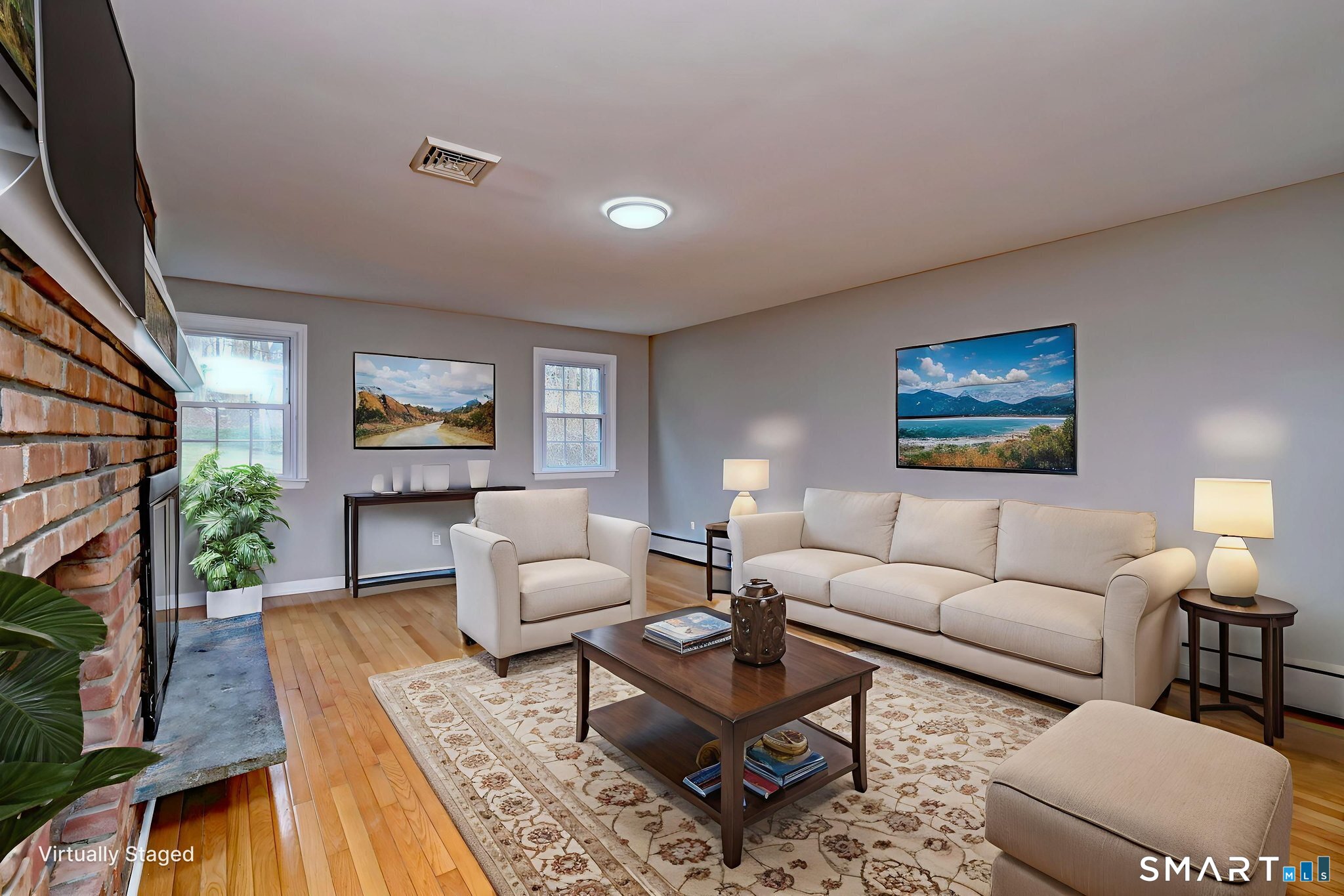 25 Shelter Rock Road Trumbull, CT 06611 - Photo 15 of 37 a living room with furniture a rug a lamp and a flat screen tv