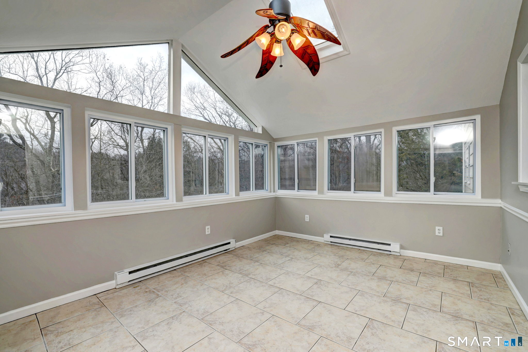 25 Shelter Rock Road Trumbull, CT 06611 - Photo 18 of 37 an empty room with windows