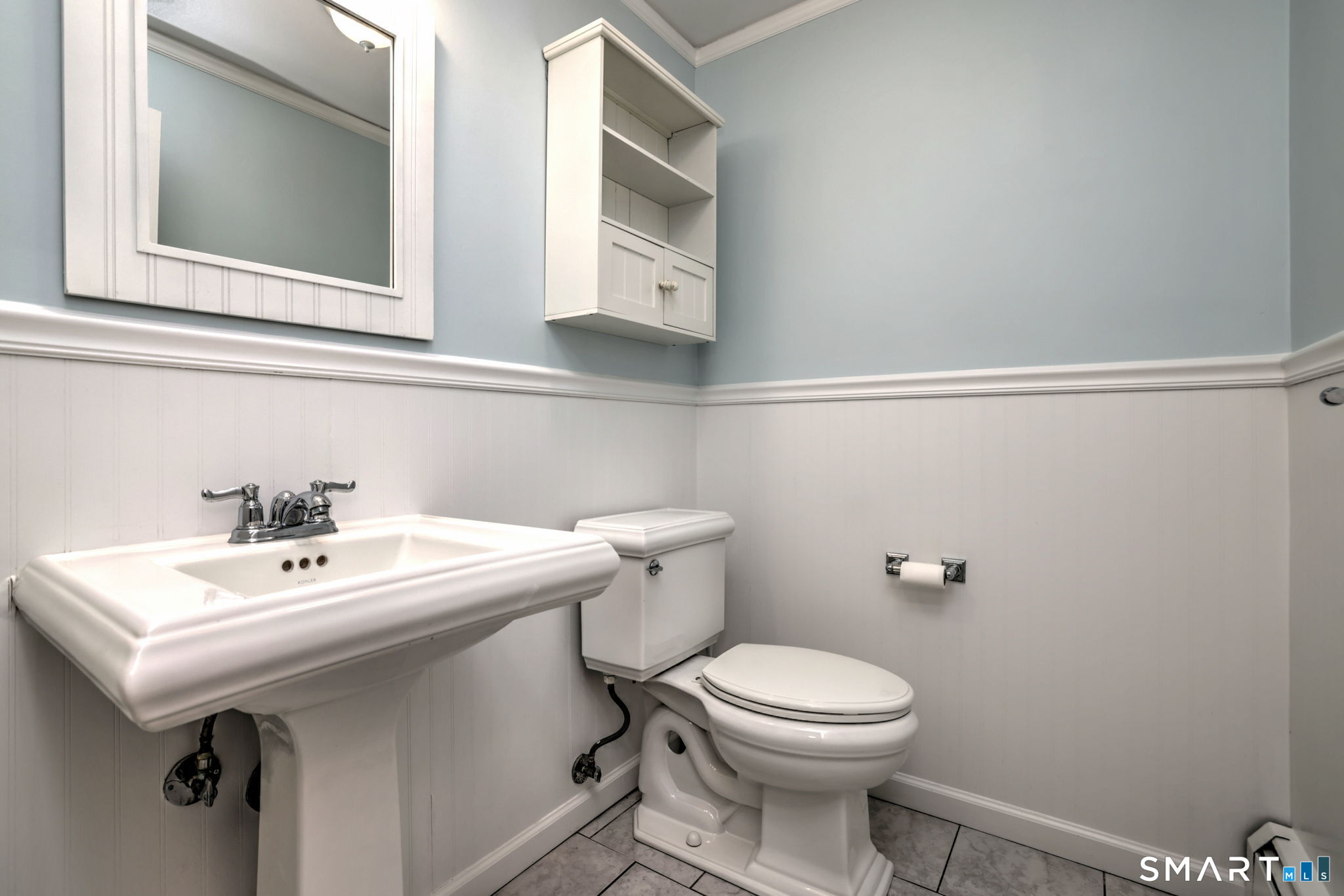 25 Shelter Rock Road Trumbull, CT 06611 - Photo 21 of 37 a bathroom with a sink mirror and toilet