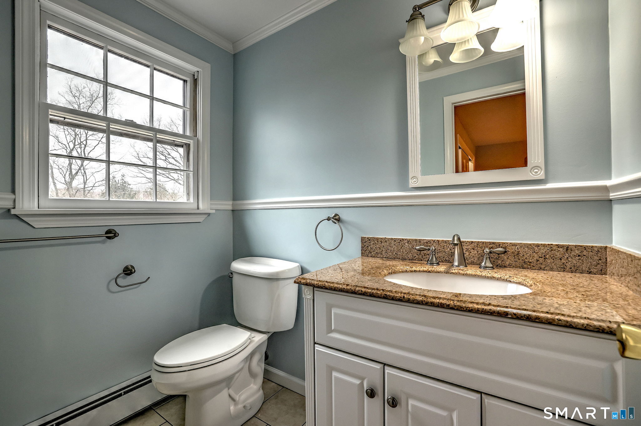 25 Shelter Rock Road Trumbull, CT 06611 - Photo 25 of 37 a bathroom with a toilet sink and mirror