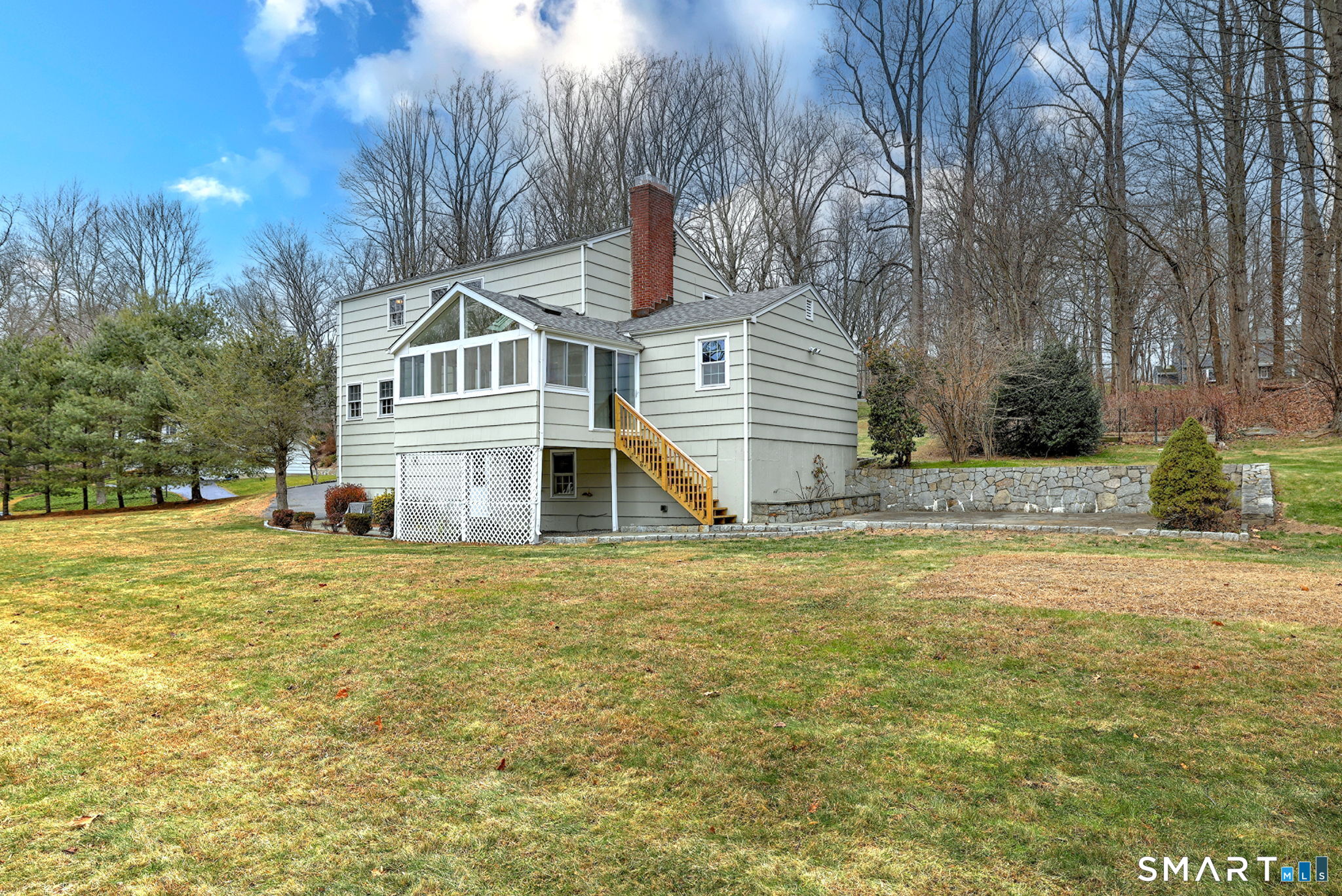 25 Shelter Rock Road Trumbull, CT 06611 - Photo 37 of 37 a front view of a house with a yard