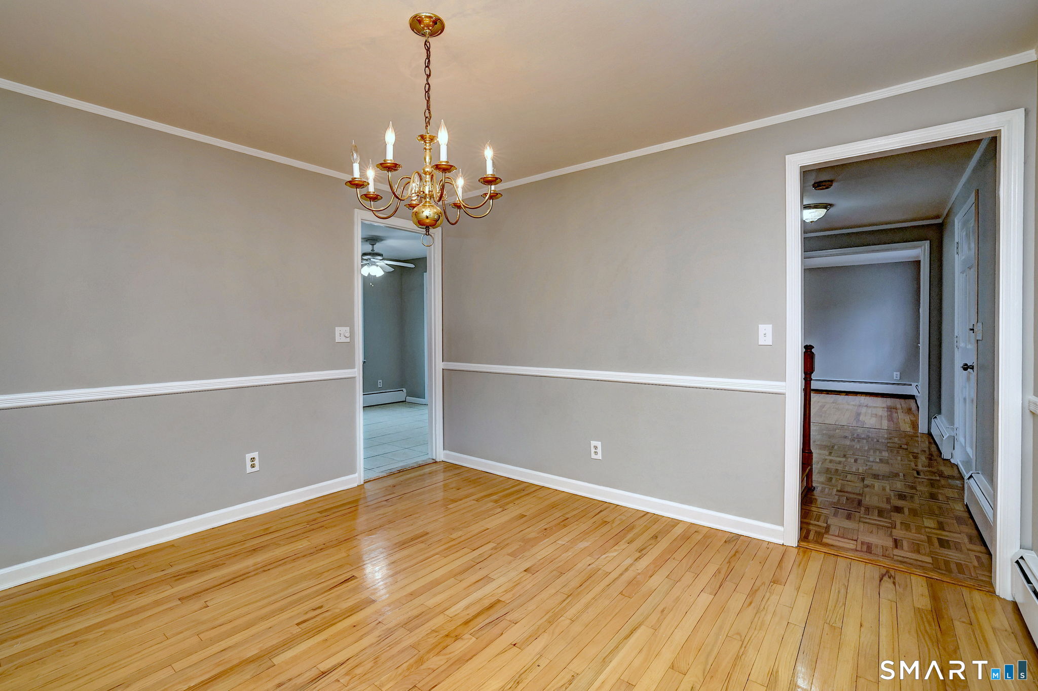 25 Shelter Rock Road Trumbull, CT 06611 - Photo 10 of 37 a view of a room with wooden floor and staircase