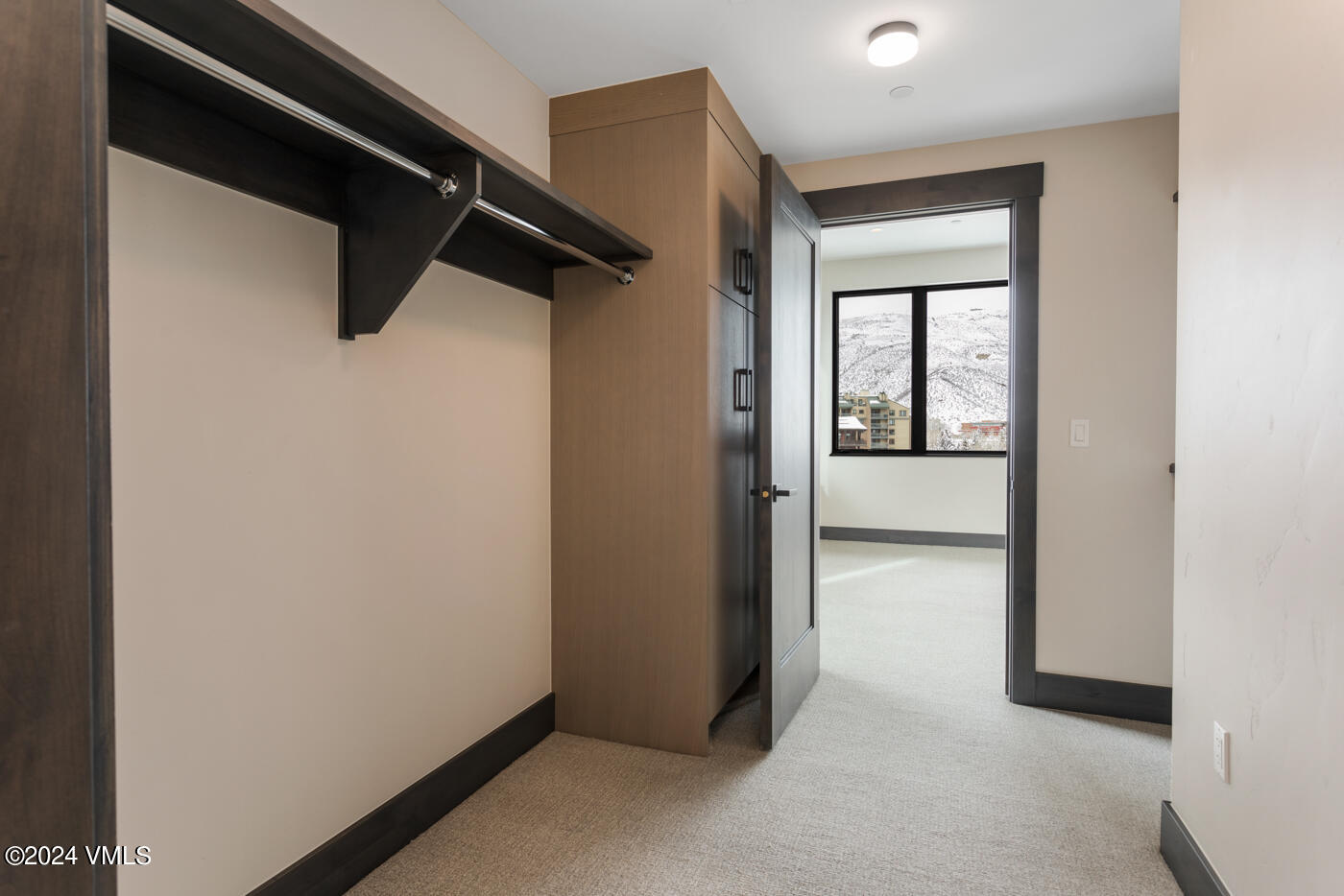 42 Riverfront Lane, Unit 507 Avon, CO 81620 - Photo 9 of 34 a view of hallway with wooden floor