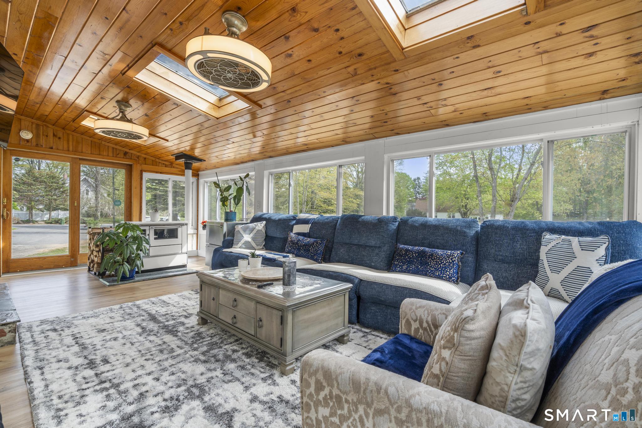 15 Pent Road Deep River, CT 06417 - Photo 14 of 36 a living room with furniture and a large window