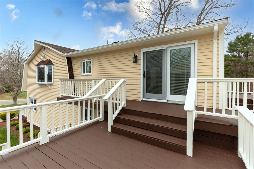 17 Weaver Street Wareham, MA 02576 - Photo 3 of 37 a view of a house with a wooden deck