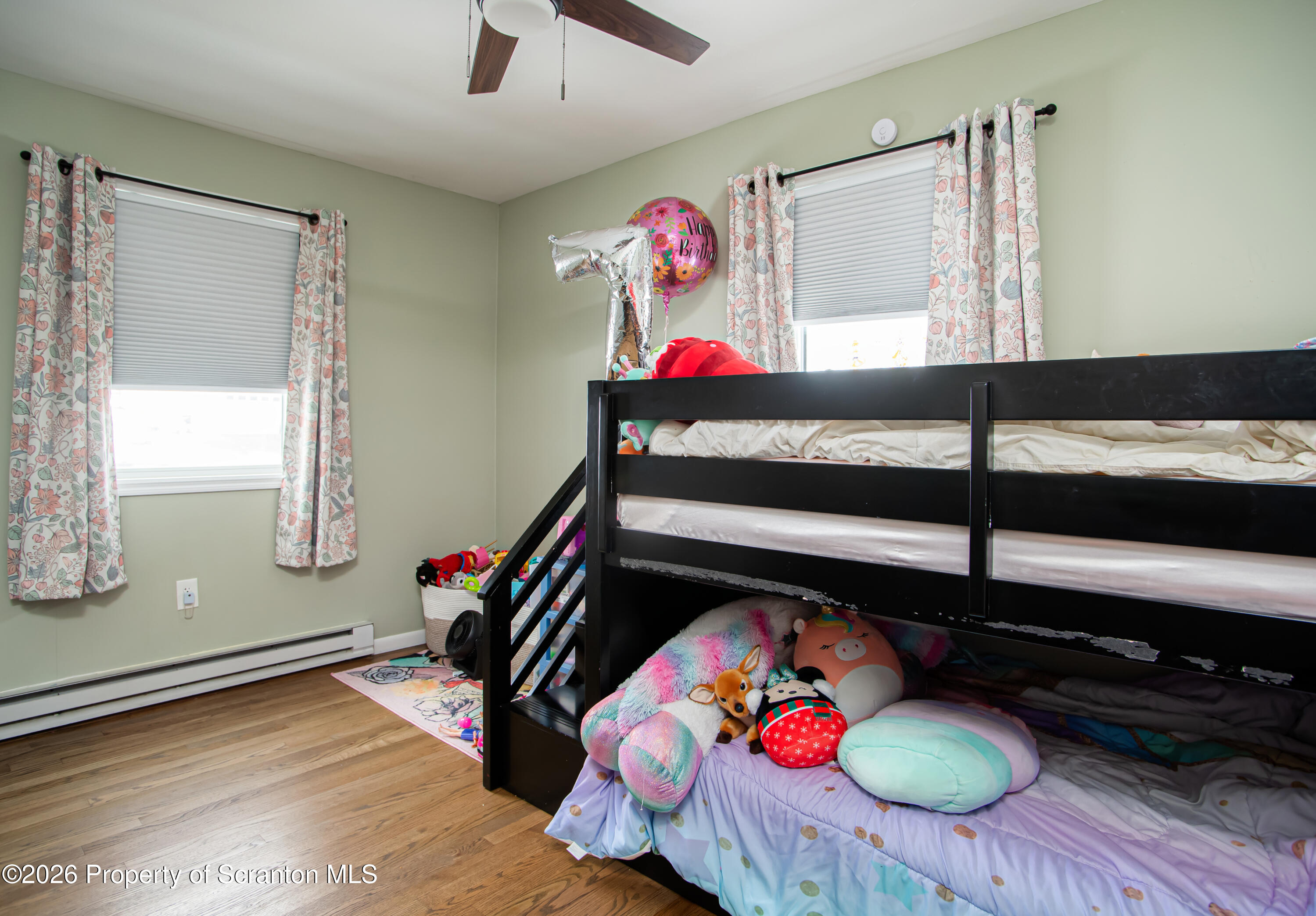 315 Tulip Circle Clarks Summit, PA 18411 - Photo 12 of 30 a bedroom with bed and a window