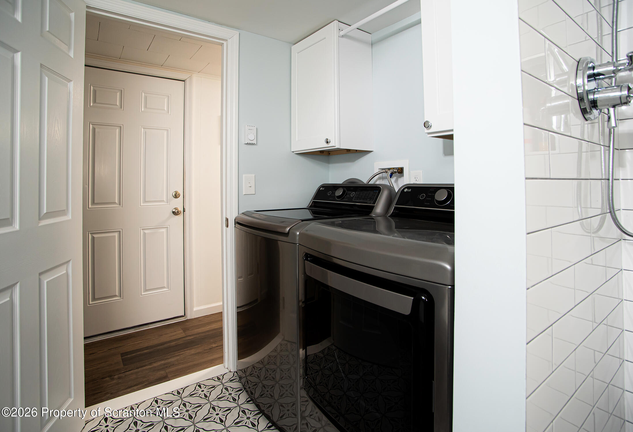 315 Tulip Circle Clarks Summit, PA 18411 - Photo 21 of 30 a kitchen with a stove and a cabinet