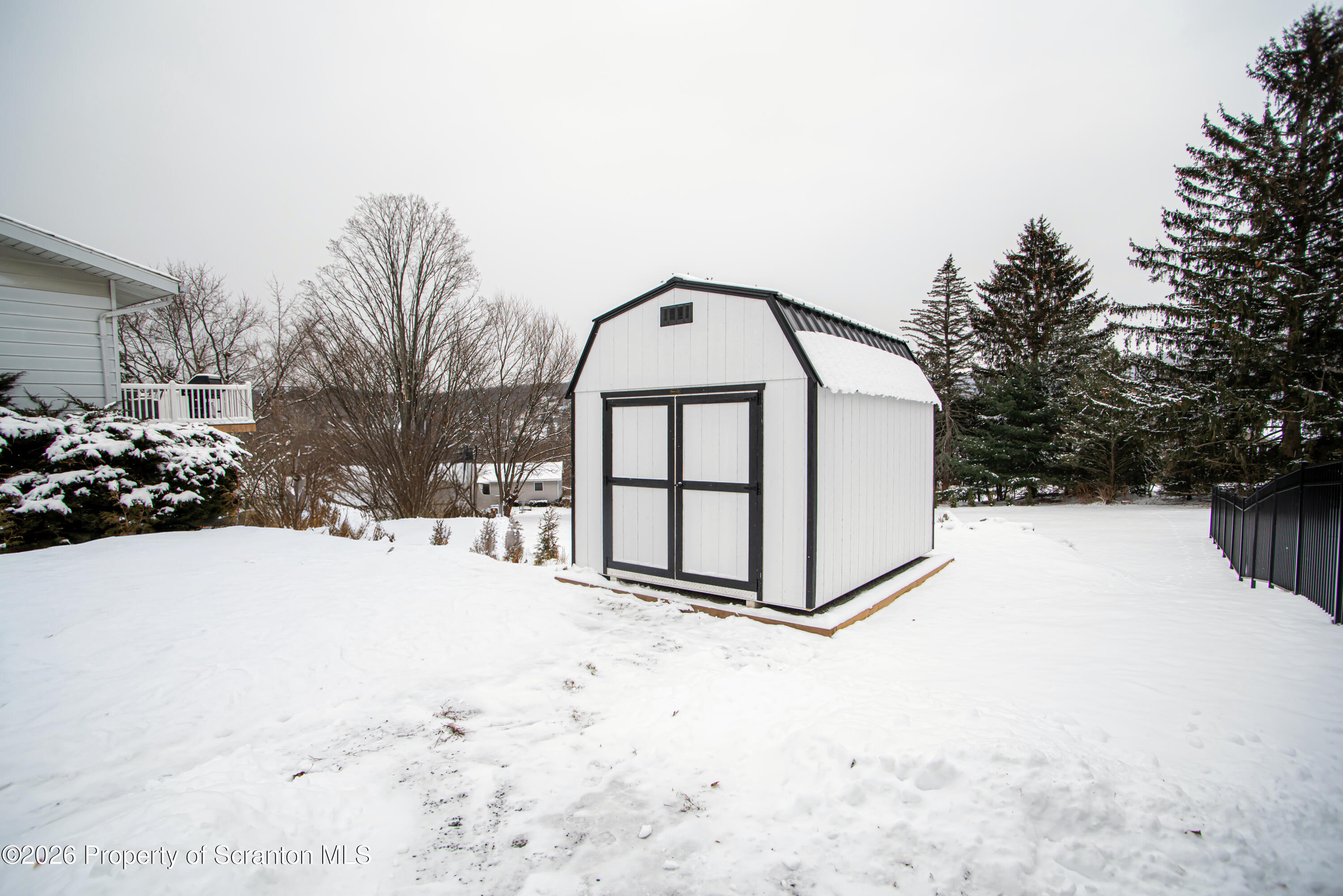315 Tulip Circle Clarks Summit, PA 18411 - Photo 24 of 30 a view of a backyard of snow