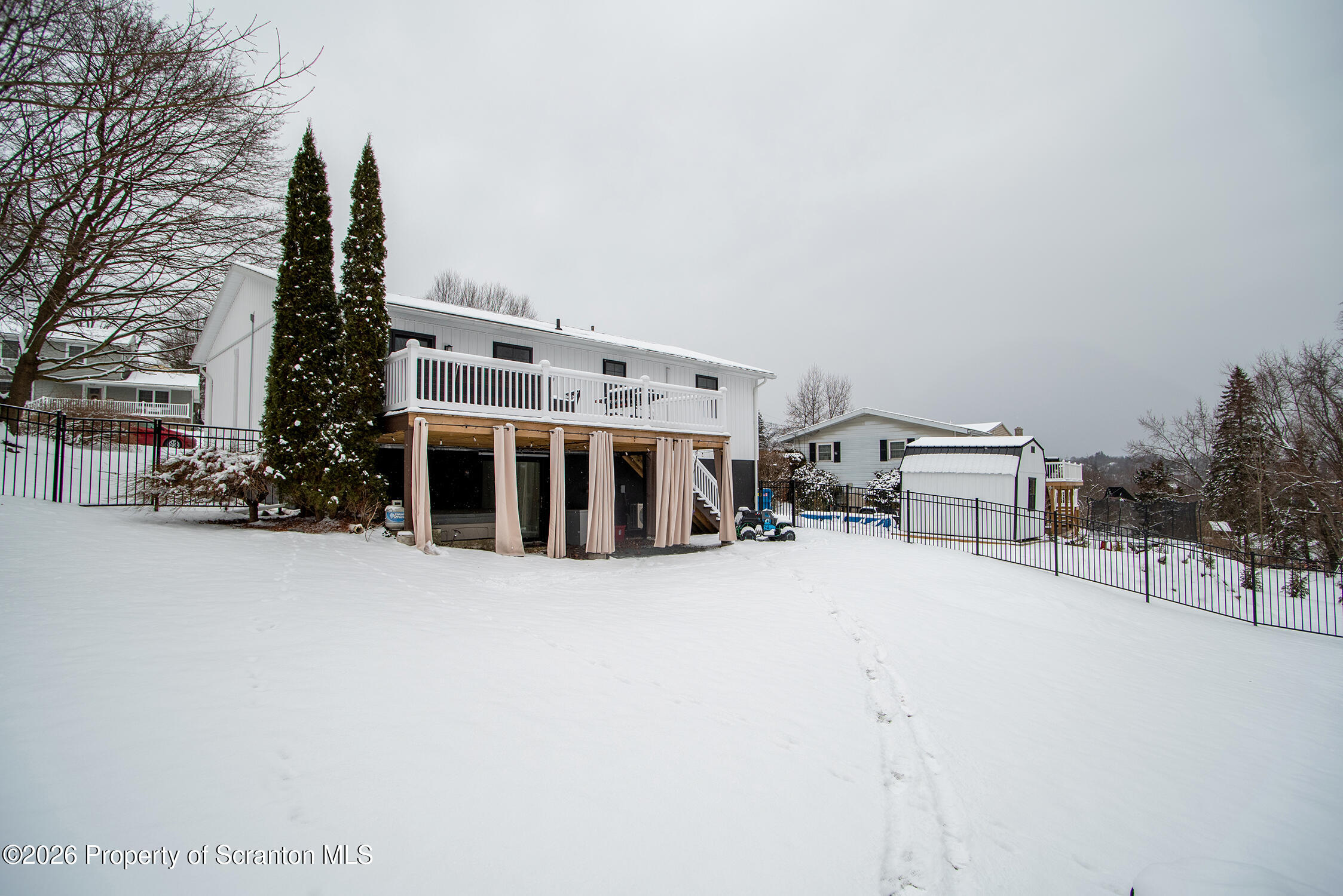 315 Tulip Circle Clarks Summit, PA 18411 - Photo 29 of 30 a view of a building with snow on roof