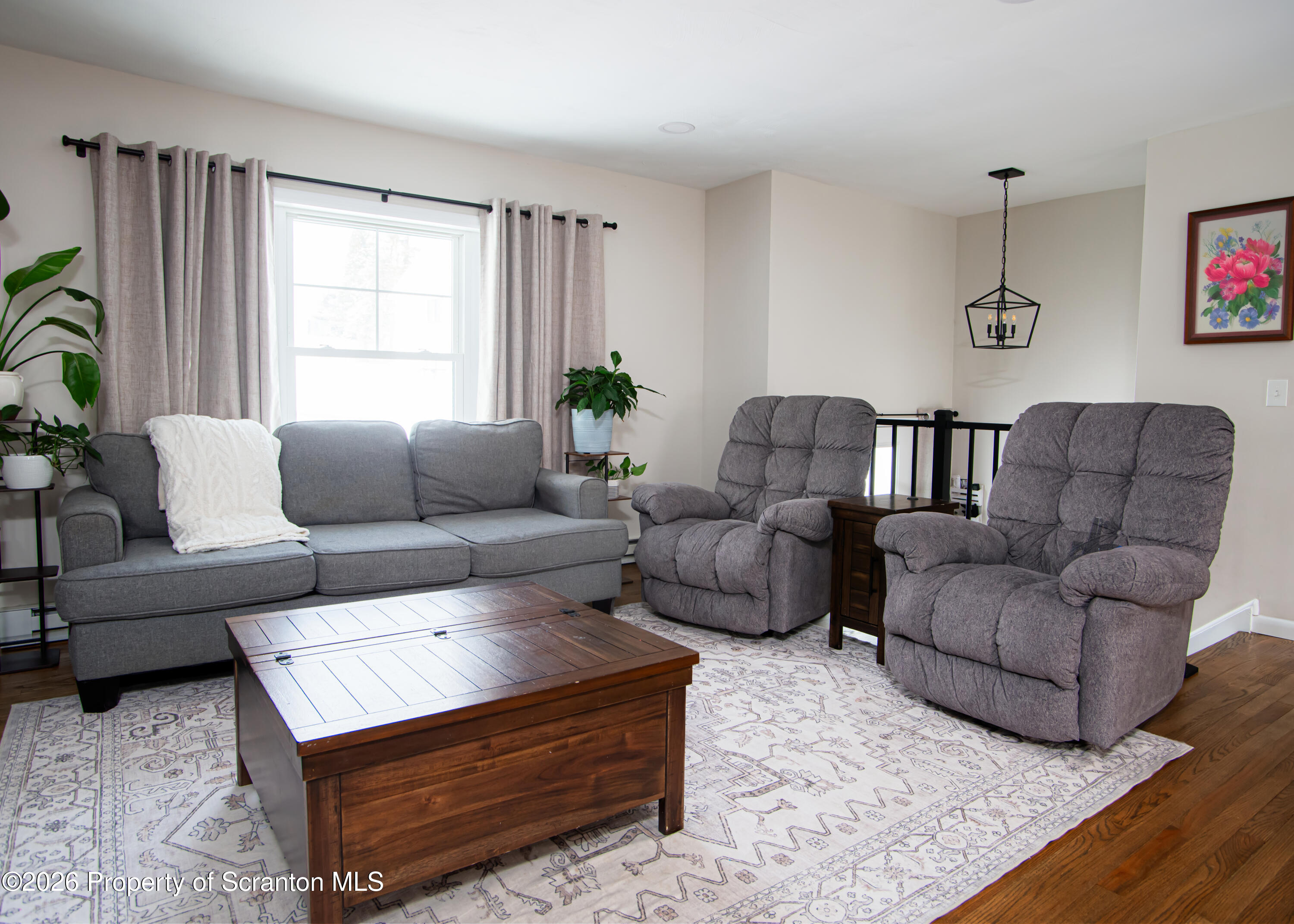 315 Tulip Circle Clarks Summit, PA 18411 - Photo 6 of 30 a living room with furniture and a large window