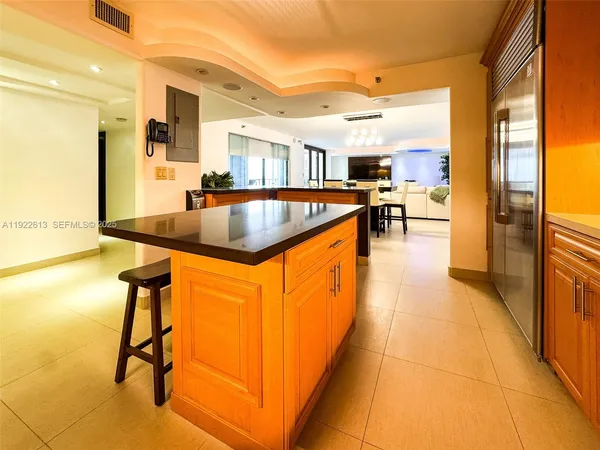 a kitchen with stainless steel appliances granite countertop sink and cabinets