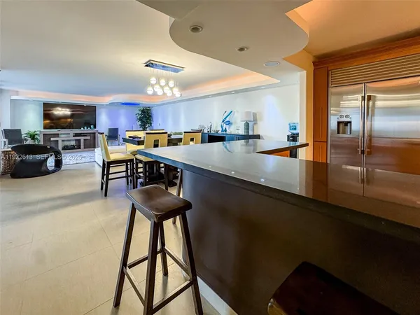 a kitchen with counter top space cabinets and stainless steel appliances