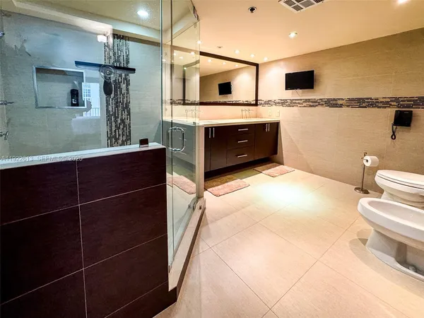a bathroom with a sink and a toilet